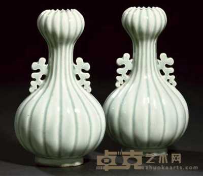 19th century A pair of pale celadon glazed lobed vases 